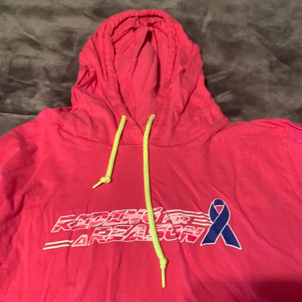 Cute light weight bright pink Riding for a reason shirt
